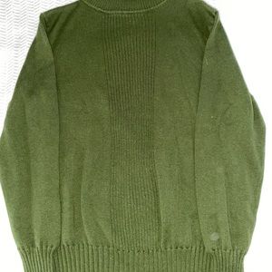 green ribbed turtleneck sweater